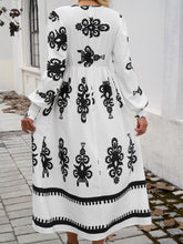 Load image into Gallery viewer, Devine Printed Surplice Lantern Sleeve Midi Dress
